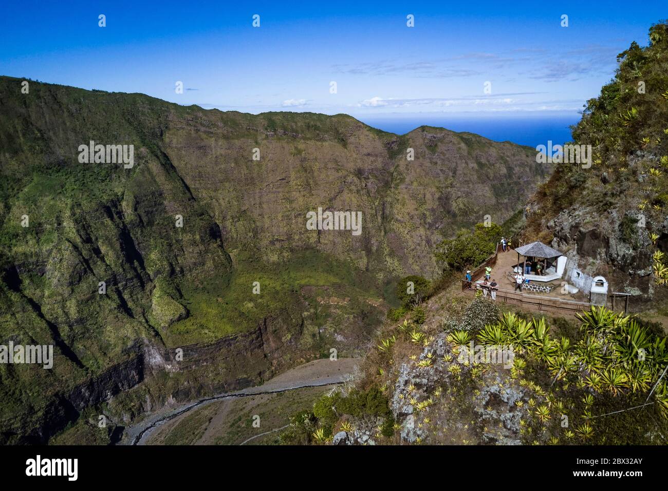 France, Reunion island (French overseas department), Reunion National Park listed as World heritage by UNESCO, La Possession, around village of Dos d'Ane, Roche Bouteille hike by the Cap Noir trail, the Rivière des Galets and the Cap Noir kiosk (aerial view) Stock Photo