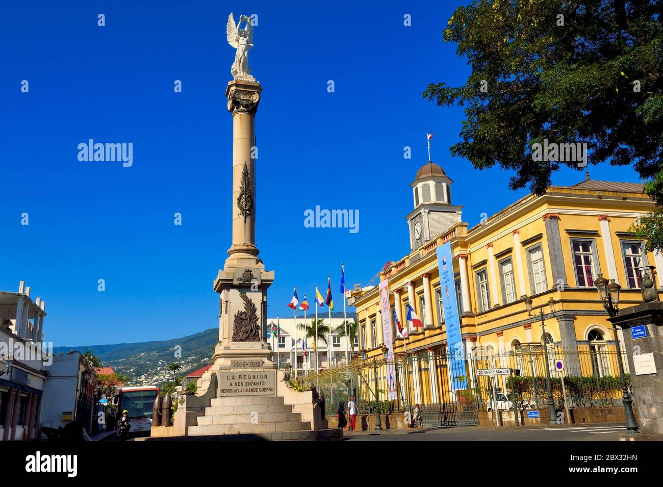 France, Reunion island (French overseas department), Saint Denis, building of the colonial era, former City Hall and the Victory Column Stock Photo