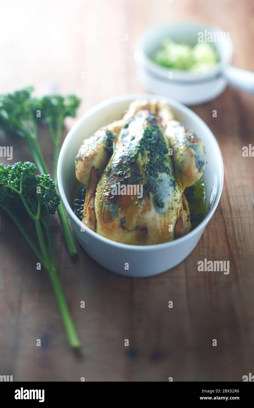 Roast chicken parsley Stock Photo