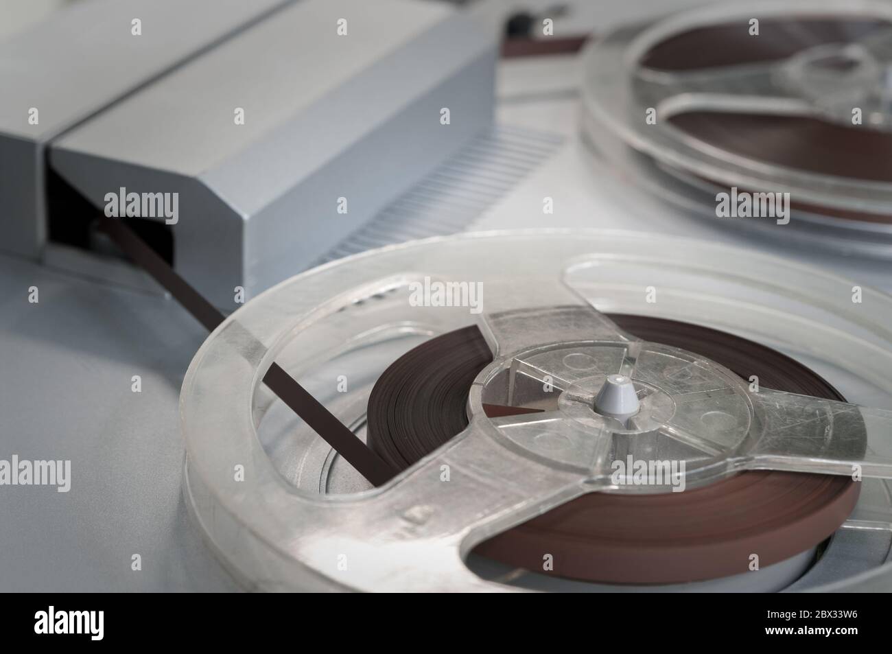 Old vintage reel-to-reel player. Tape recorder with spools. Bobbin tape recorder Stock Photo