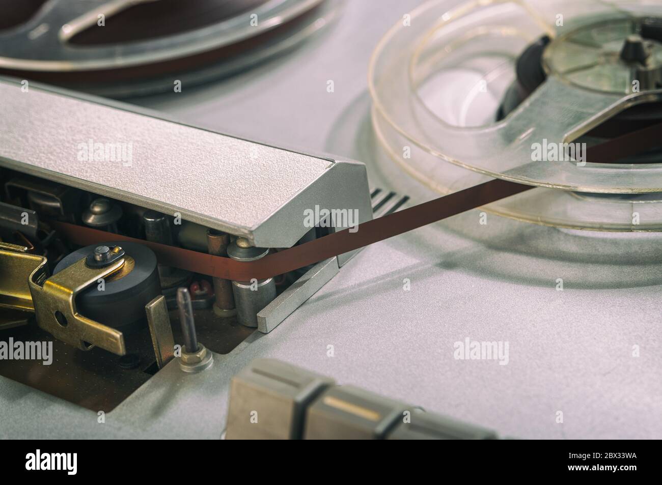 Old vintage reeltoreel player. Tape recorder with spools. Bobbin tape