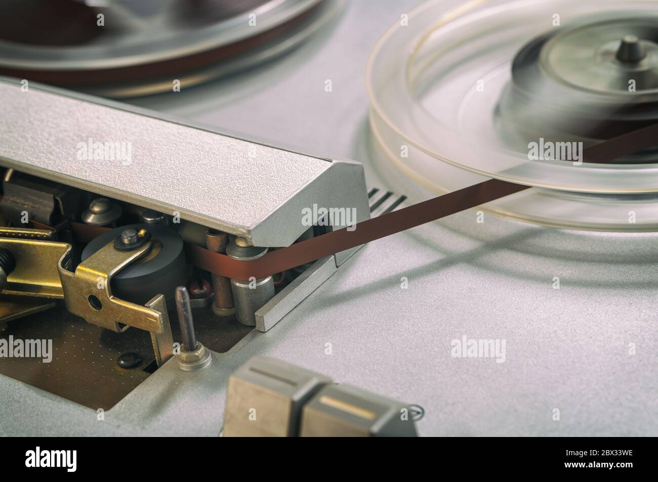 Old vintage reeltoreel player. Tape recorder with spools. Bobbin tape