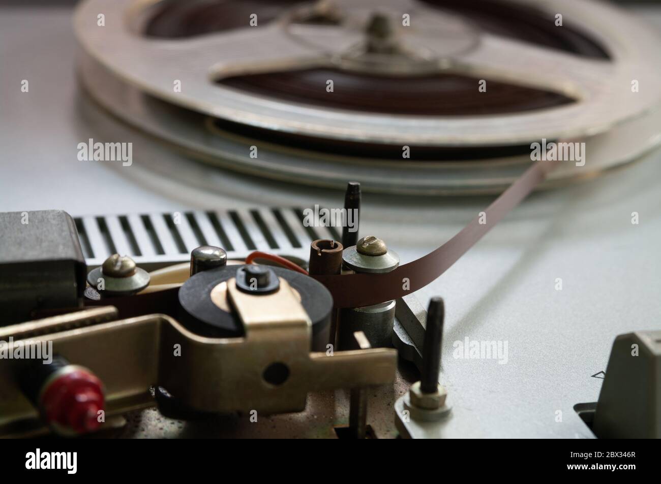 Old vintage reel-to-reel player. Tape recorder with spools. Bobbin tape recorder Stock Photo