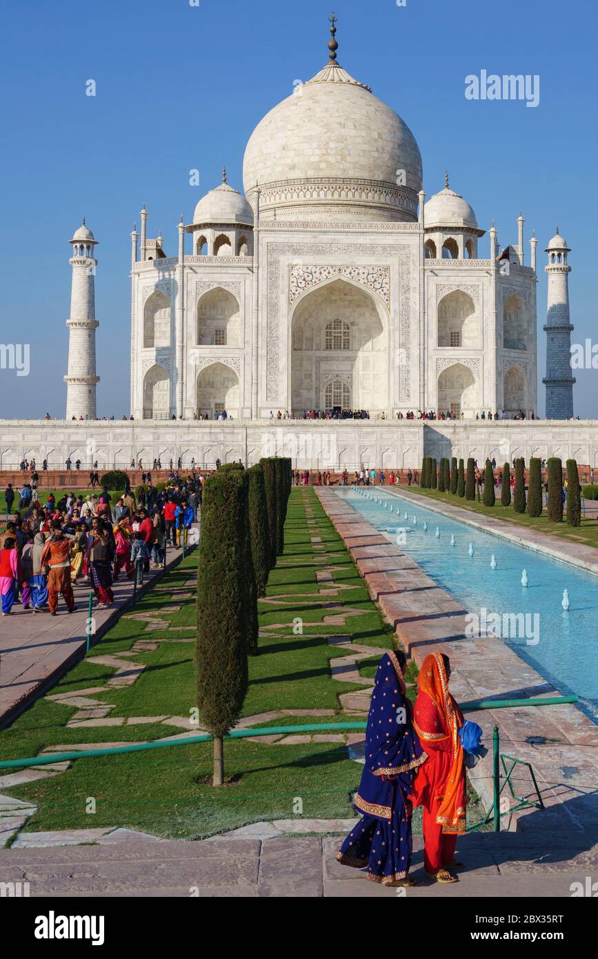 Indian tourists in saris in front of Taj Mahal in Agra, India Stock Photo