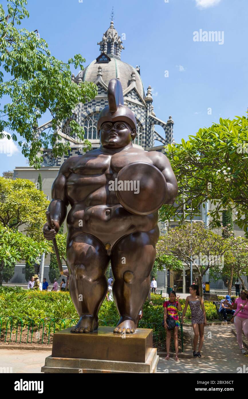 Colombia, Antioquia Department, Medellin, Botero place, sculpture Soldado Romano by Fernando Botero, palace of Culture Rafael Uribe Uribe in the background Stock Photo