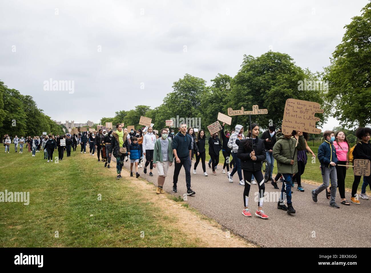 Windsor, UK. 4 June, 2020.  Hundreds of young people take part in a peaceful protest march along the Long Walk in front of Windsor Castle in solidarity with the Black Lives Matter movement. The march was organised at short notice by Jessica Christie at the request of her daughter Yani, aged 12, following the death of George Floyd while in the custody of police officers in Minneapolis in the United States. Credit: Mark Kerrison/Alamy Live News Stock Photo