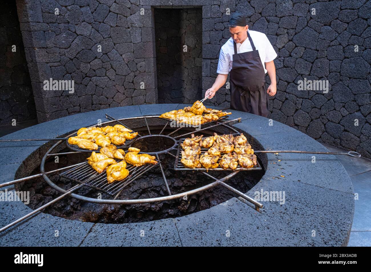 Spain, Canary islands, Lanzarote island, Timanfaya National Park or  Montañas del Fuego, the restaurant El Diablo uses a grill located above a  volcanic chimney Stock Photo - Alamy