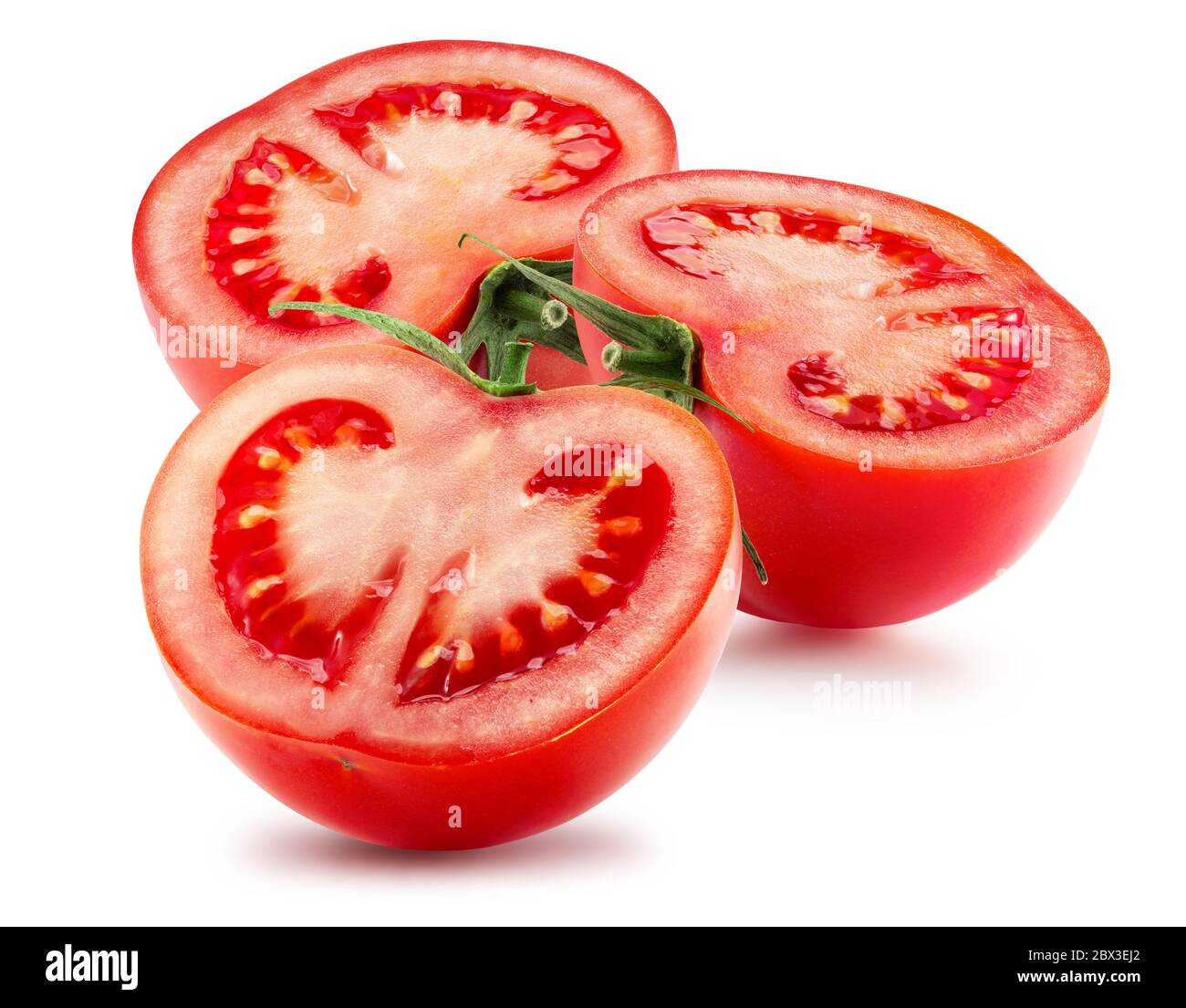 tomato halves isolated on a white background Stock Photo - Alamy