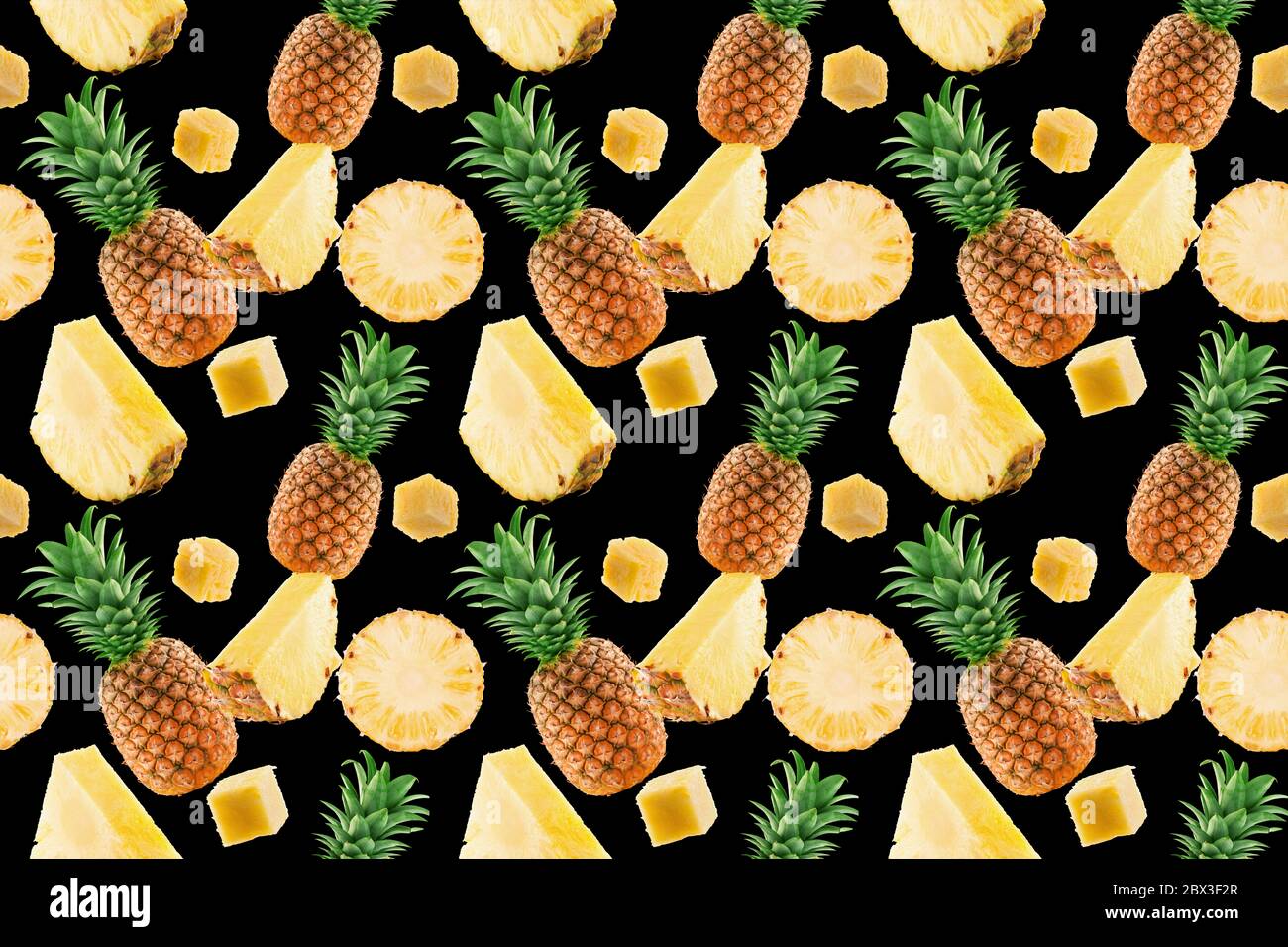 seamless pattern with pineapple and pineapple slices on a black background. Stock Photo