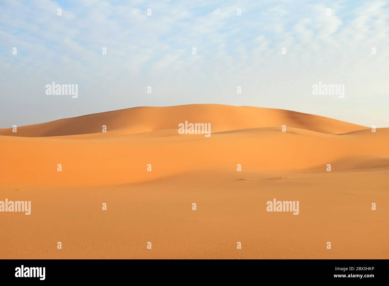 Bright orange desert landscape sand dunes in Al Dahna Desert, Riyadh, Saudi Arabia. Stock Photo