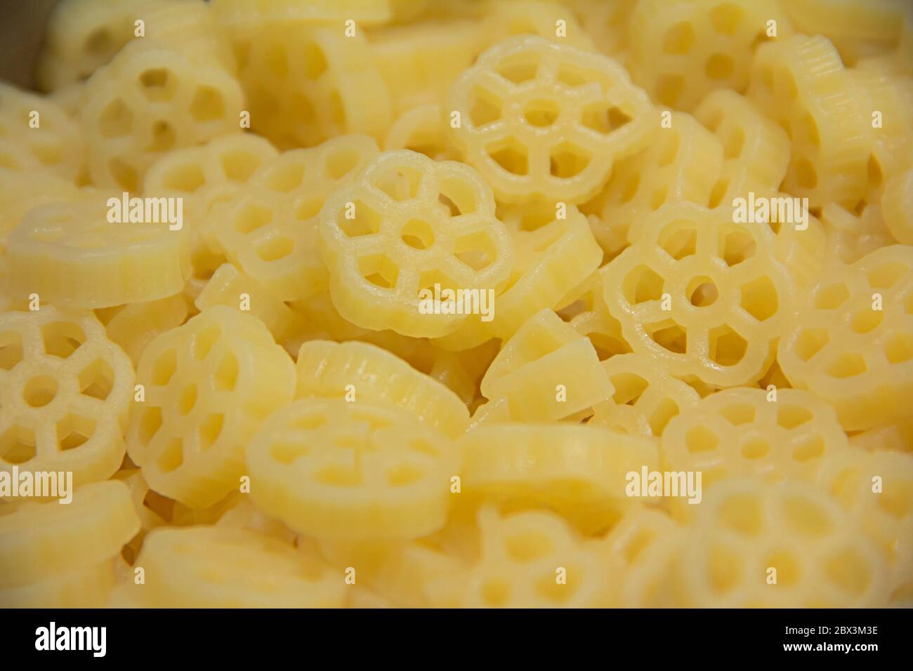 Cooked Fiori pasta (flower pasta) made of Hard wheat varieties in a pan
