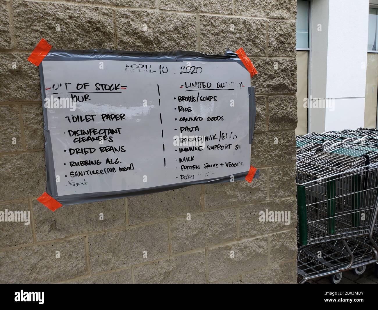 A whiteboard, updated daily, lists items which are sold out or have limited supply at a Whole Foods Market store in San Ramon, California during an outbreak of the COVID-19 coronavirus, April 12, 2020. () Stock Photo