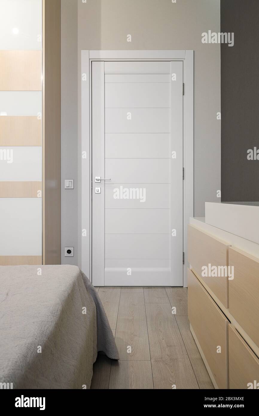 White wooden interior door in a modern interior Stock Photo Alamy