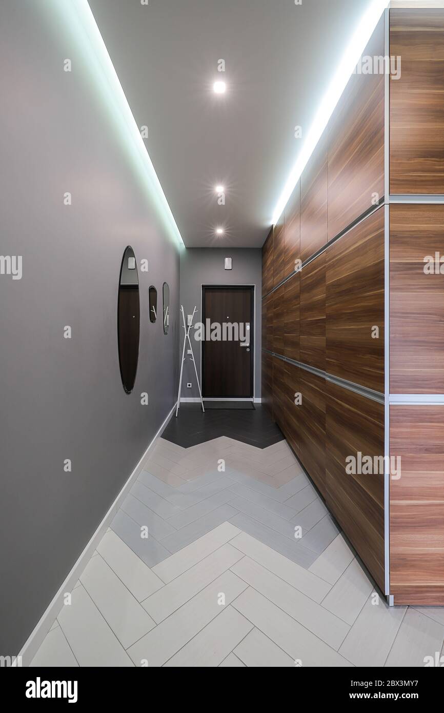 Entrance door in the corridor modern apartment interior Stock Photo - Alamy