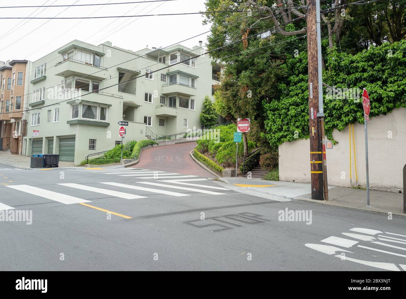 The iconic Lombard Street in San Francisco, California was deserted during an outbreak of the COVID-19 coronavirus, April 8, 2020. () Stock Photo