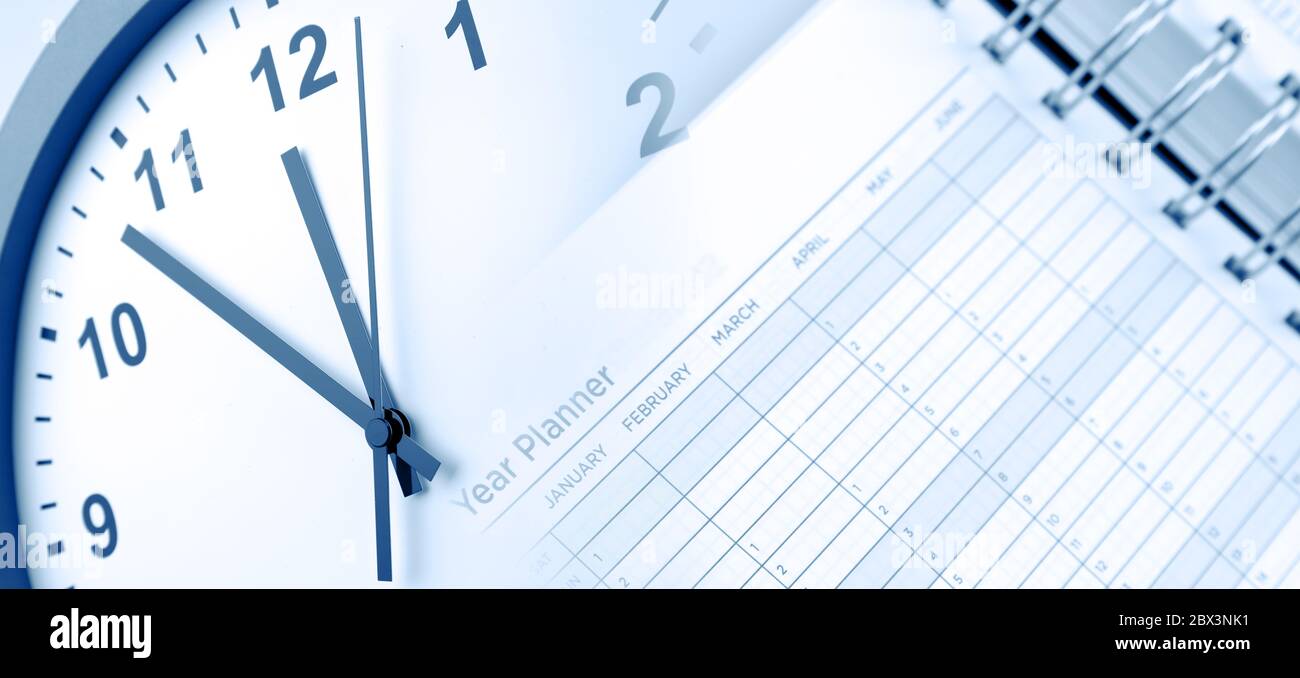 Clock face and year planner Stock Photo