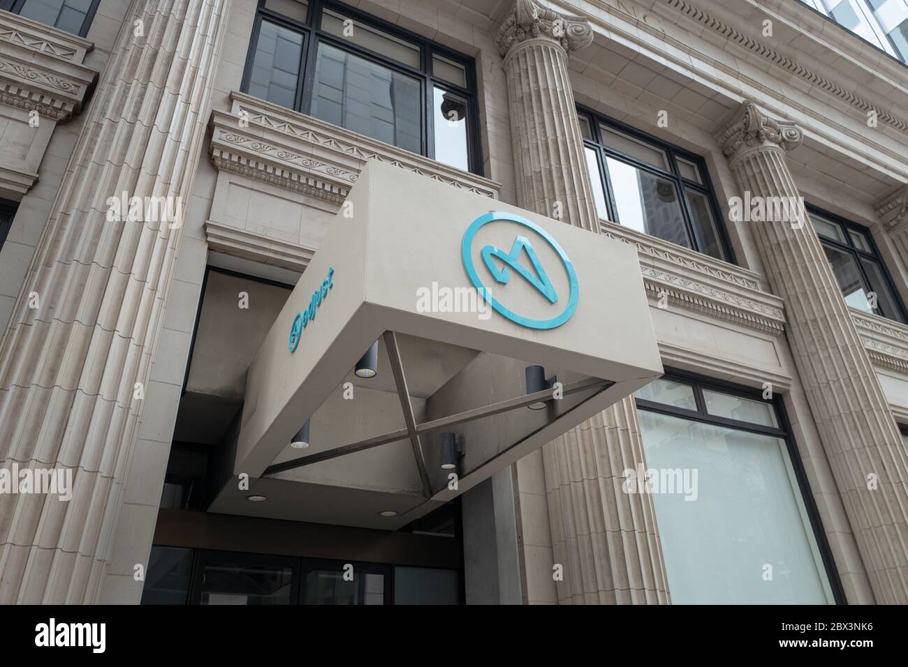 Facade with logo at headquarters of software company Adjust in San