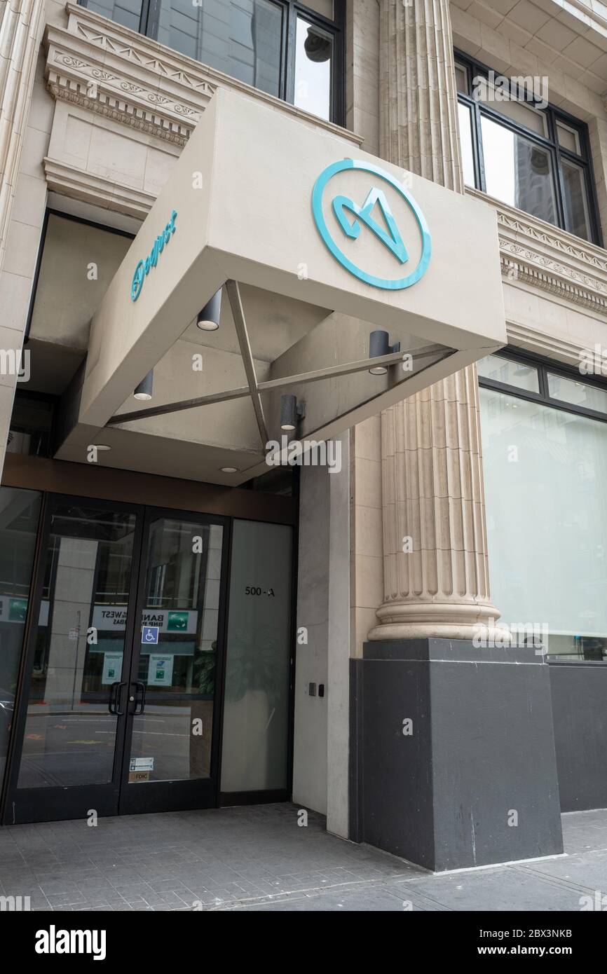 Facade with logo at headquarters of software company Adjust in San