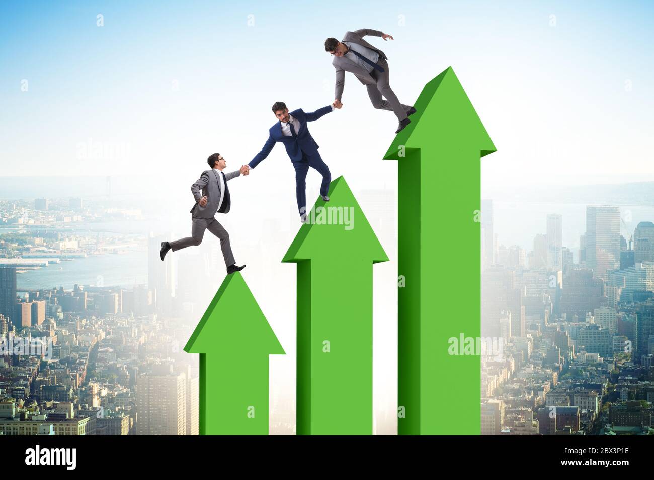 Colleagues helping each other to improve the results Stock Photo - Alamy