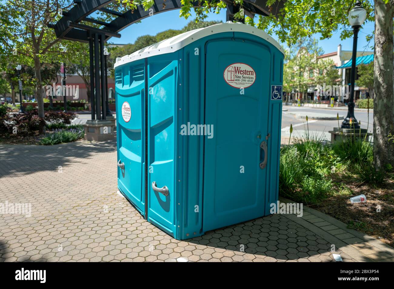 Portable restrooms are visible in the Silicon Valley, Mountain View, California during an outbreak of the COVID-19 coronavirus, April 24, 2020. With laws prohibiting the use of many restaurant and other public restrooms, many cities have installed temporary facilities for the homeless, essential workers, and others. () Stock Photo