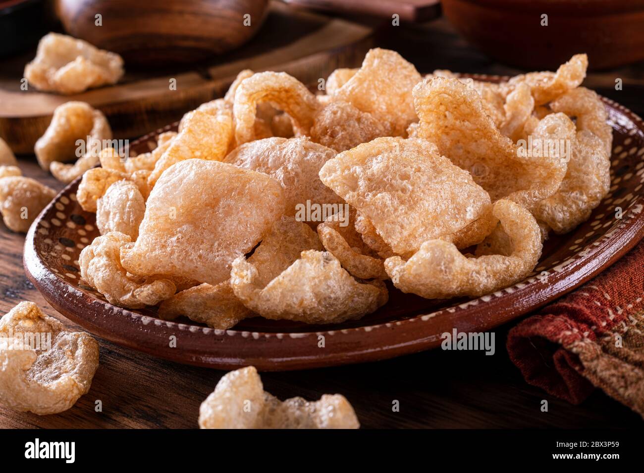 A plate of delicious deep fried pork rind chicharrones. Stock Photo