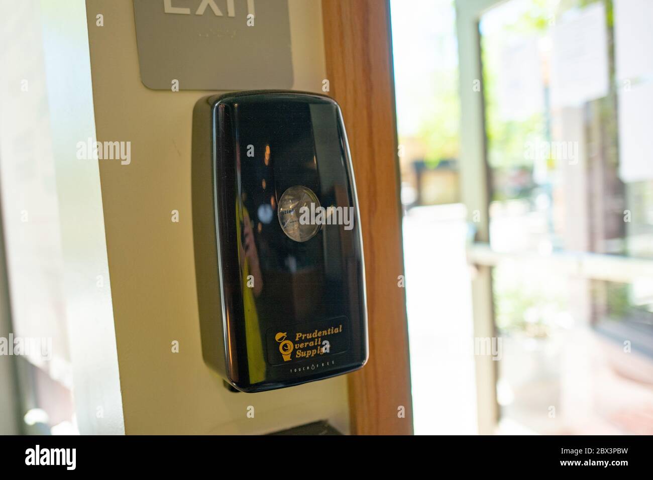 A hand sanitizer station is visible at the entrance to a restaurant in the Silicon Valley, Mountain View, California during an outbreak of the COVID-19 coronavirus, April 24, 2020. () Stock Photo