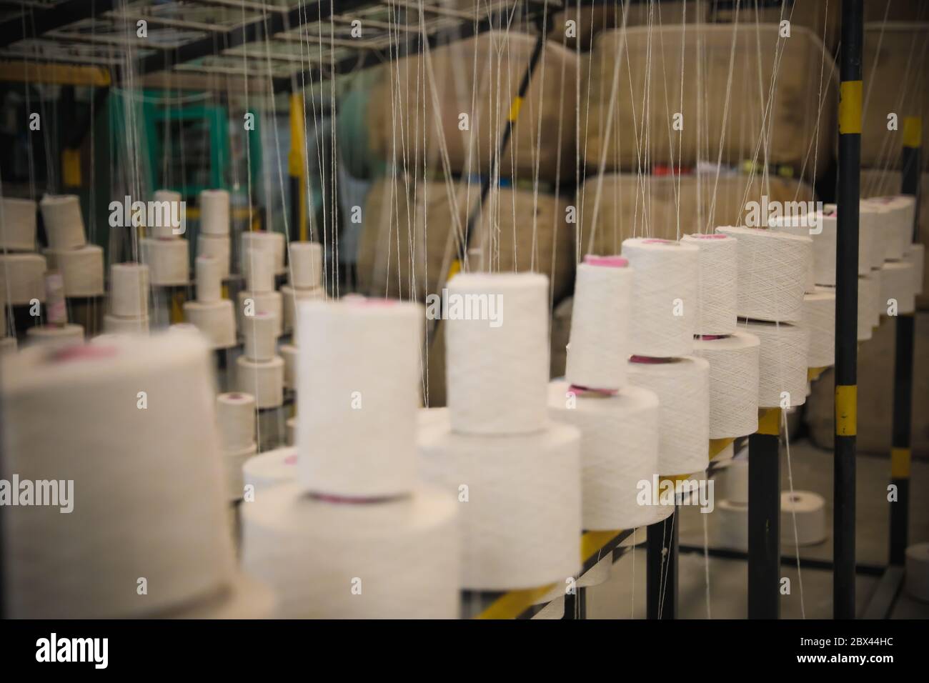 Thread rolls in Fabric factory Stock Photo