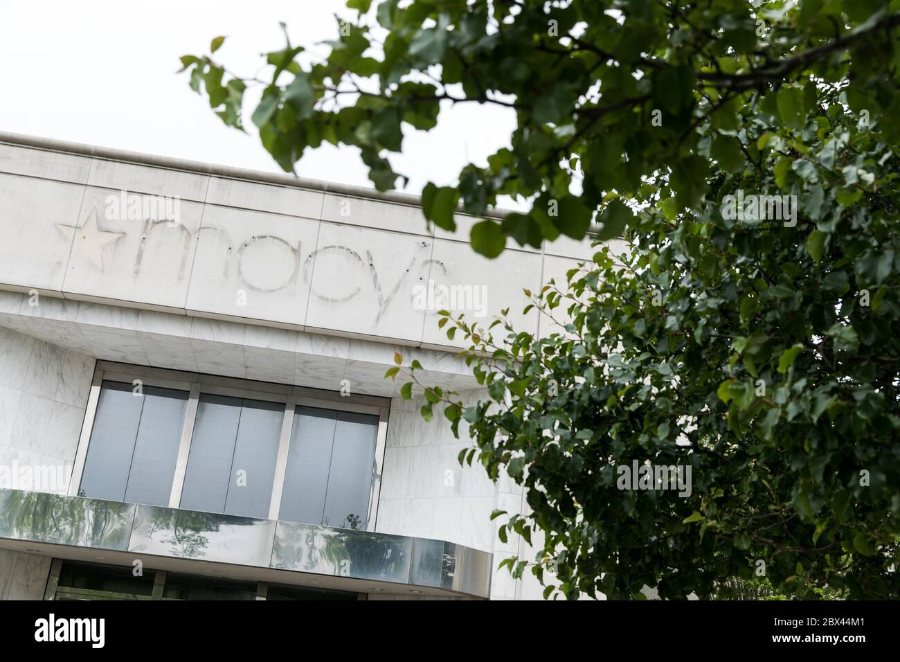 The faded outline of a logo sign outside of a closed and abandoned Macys retail store location in Salisbury, Maryland on May 25, 2020. Stock Photo