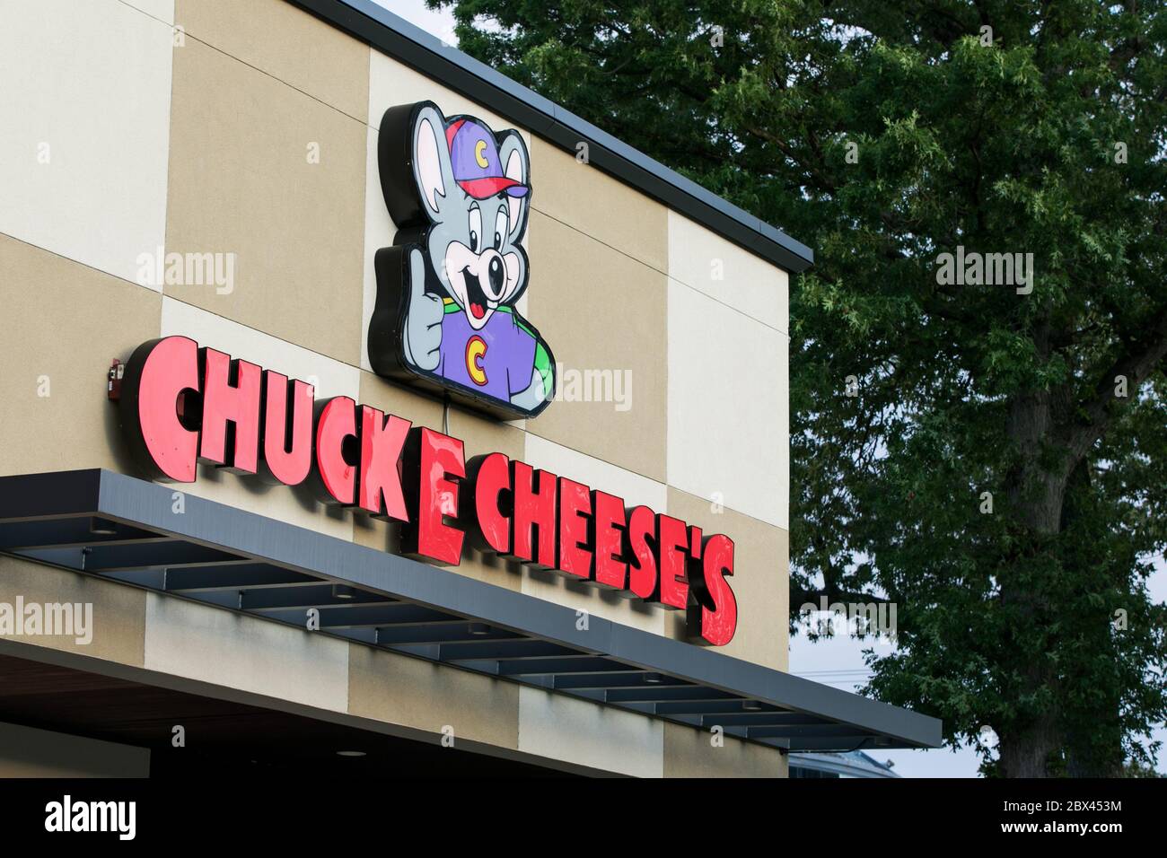 A logo sign outside of a Chuck E. Cheese location in Annapolis, Maryland on May 25, 2020. Stock Photo