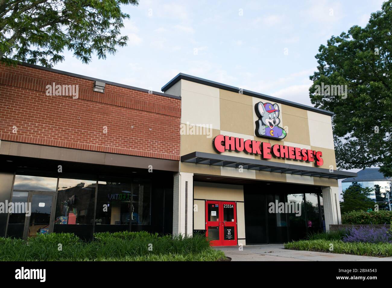 A logo sign outside of a Chuck E. Cheese location in Annapolis, Maryland on May 25, 2020. Stock Photo