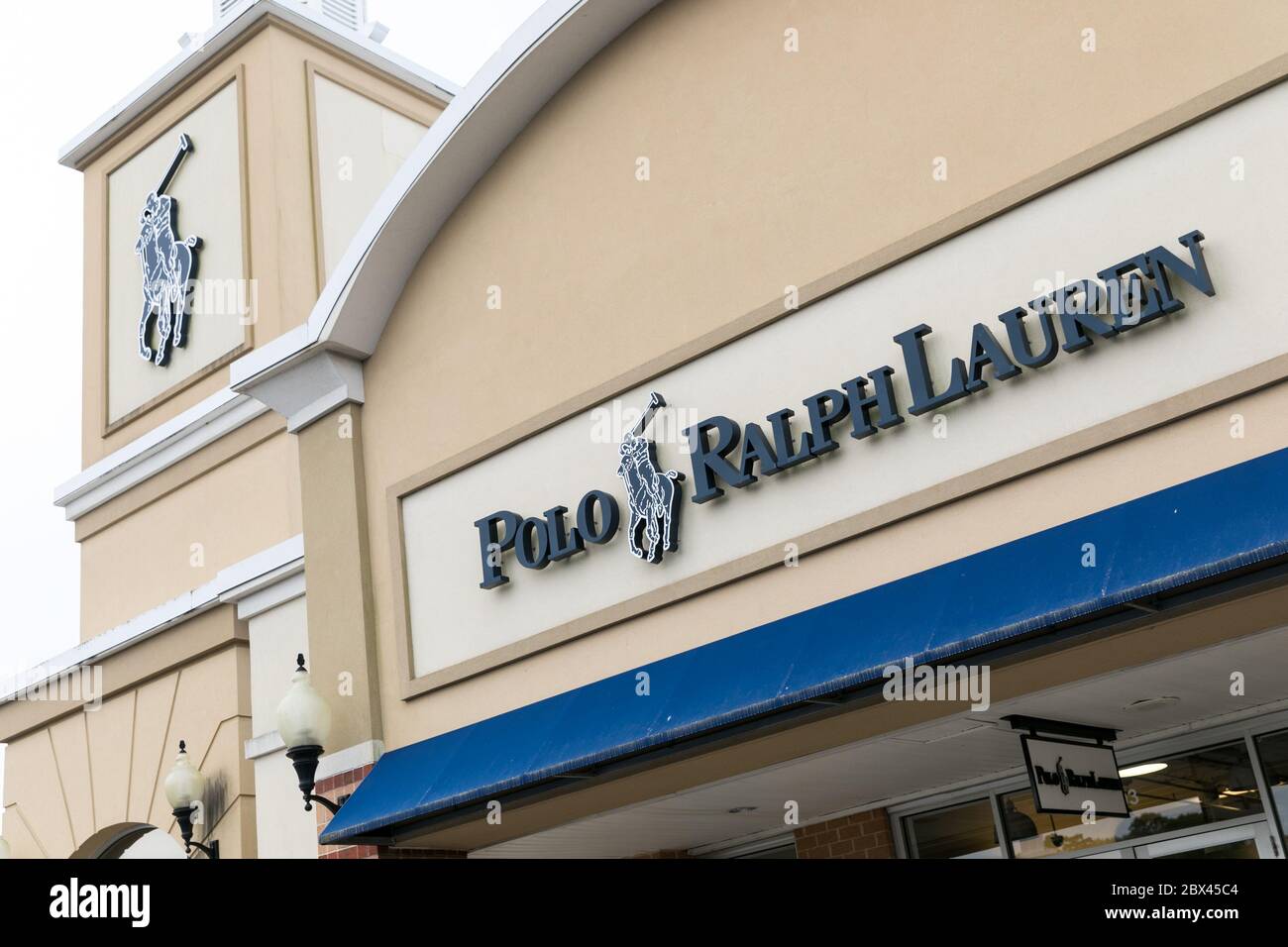 A logo sign outside of a Polo Ralph Lauren Factory retail store in  Queenstown, Maryland on May 25, 2020 Stock Photo - Alamy