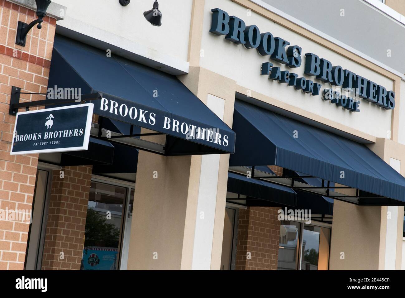 A logo sign outside of a Brooks Brothers Factory retail store in Queenstown, Maryland on May 25, 2020. Stock Photo