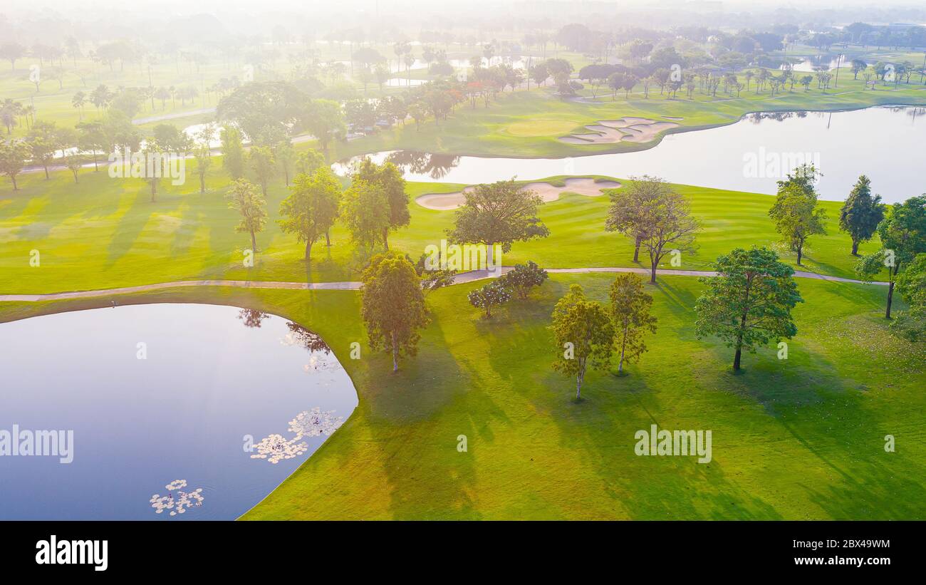 Aerial view of golf field landscape with sunrise view in the morning