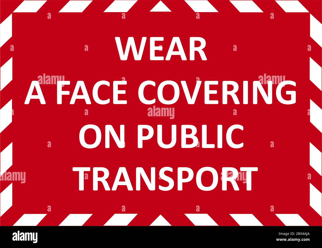 WEAR A FACE COVERING ON PUBLIC TRANSPORT warning sign. Red quarantine sign that help to battle against Covid-19 in the United Kingdom. RASTER. Stock Photo