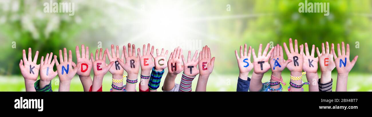 Kids Hands, Kinderrechte Staerken Means Strengthen Children Rights, Grass Meadow Stock Photo