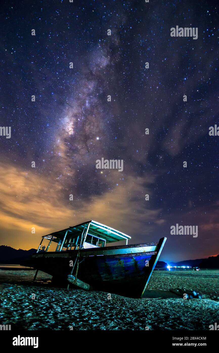 Amazing beautiful of night sky Milky Way Galaxy with abandon fisherman ...
