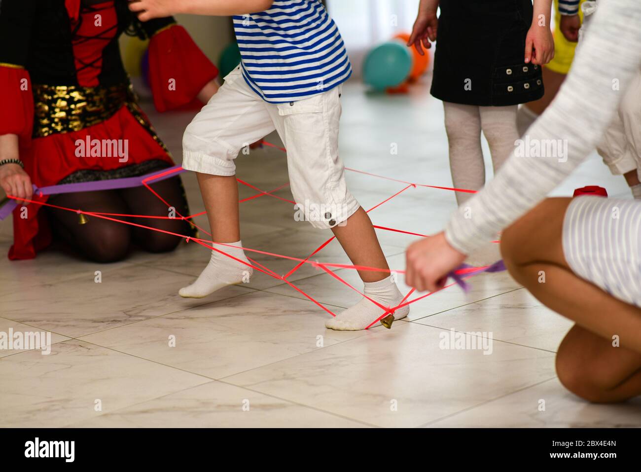 Children jumping rope hi-res stock photography and images - Alamy