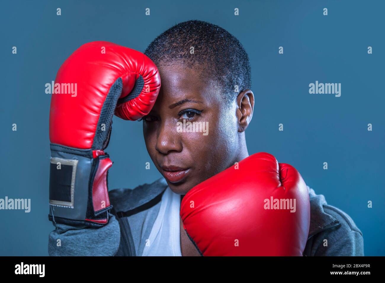 close up face portrait of young angry and defiant black afro American