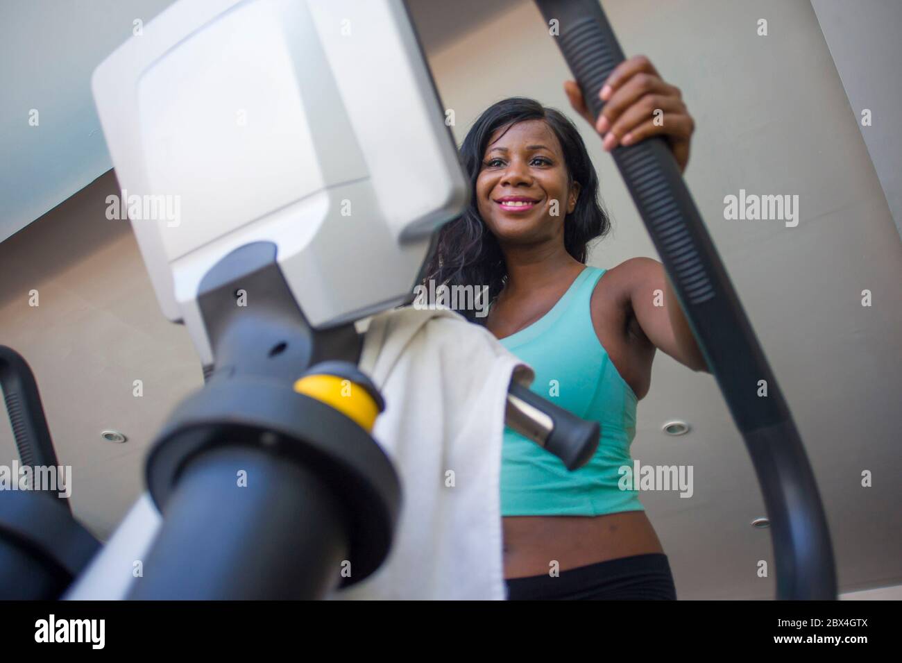 lifestyle gym portrait of young attractive and happy black African ...