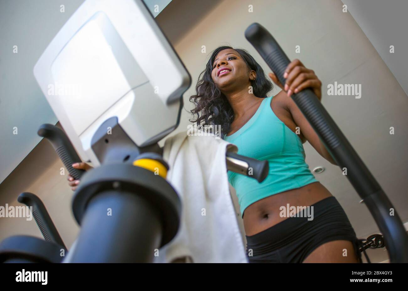 lifestyle gym portrait of young attractive and happy black African ...