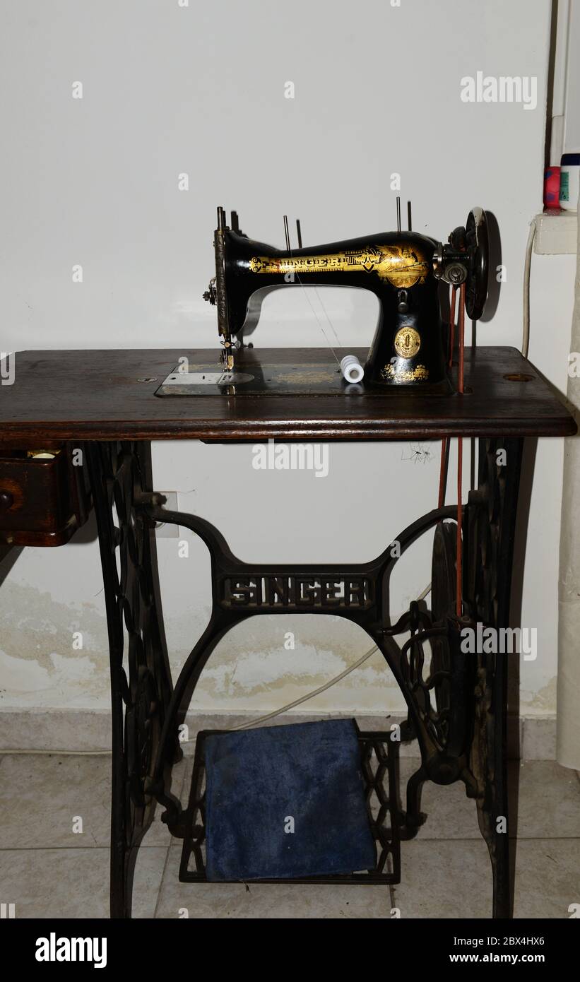 An old Singer sowing machine in a house in a rural village in the