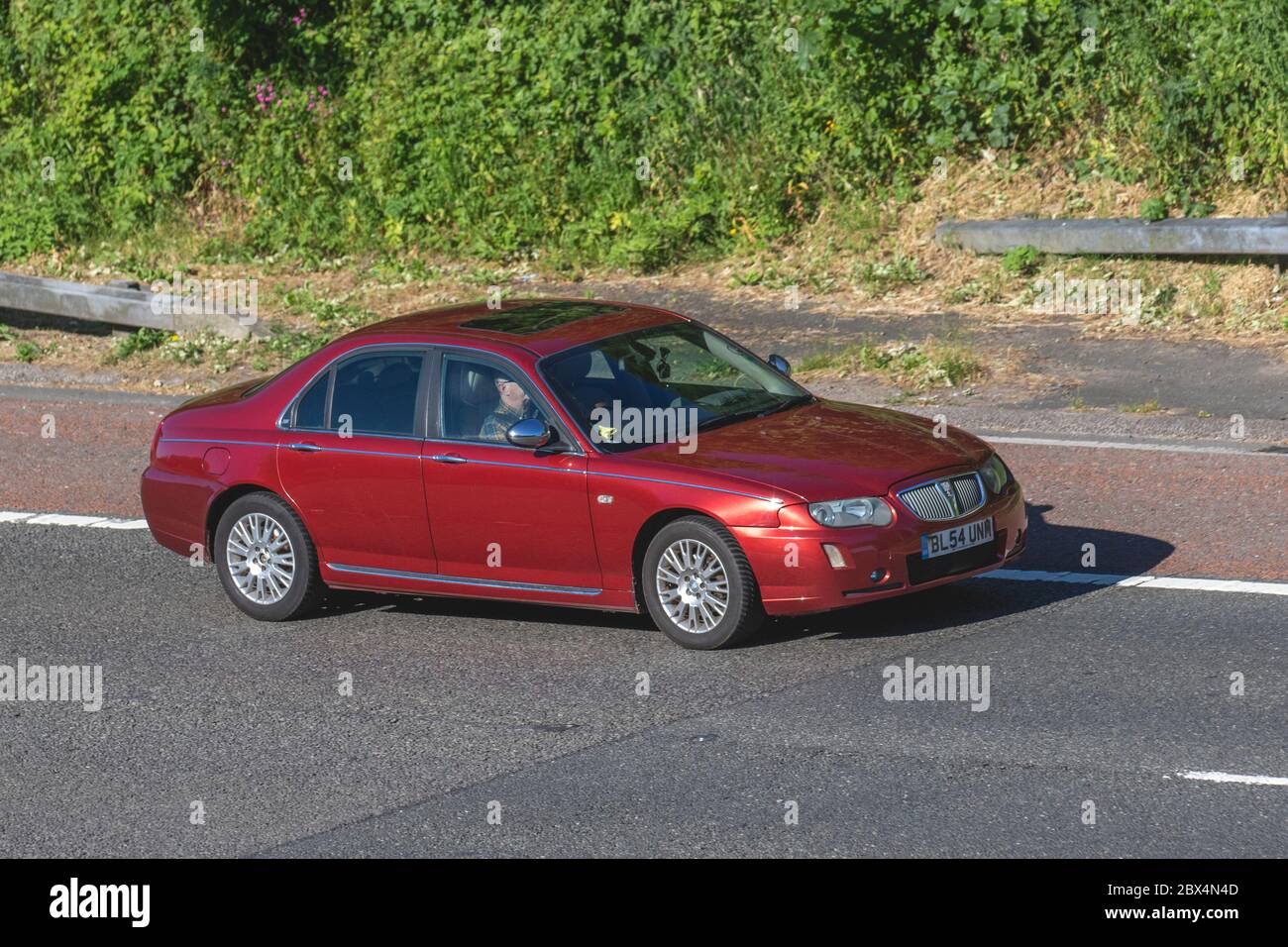 2005 Rover 75 Connoisseur SE CDTI; Vehicular traffic moving vehicles, cars driving vehicle on UK roads, motors, motoring traffic on the M61 motorway. Stock Photo