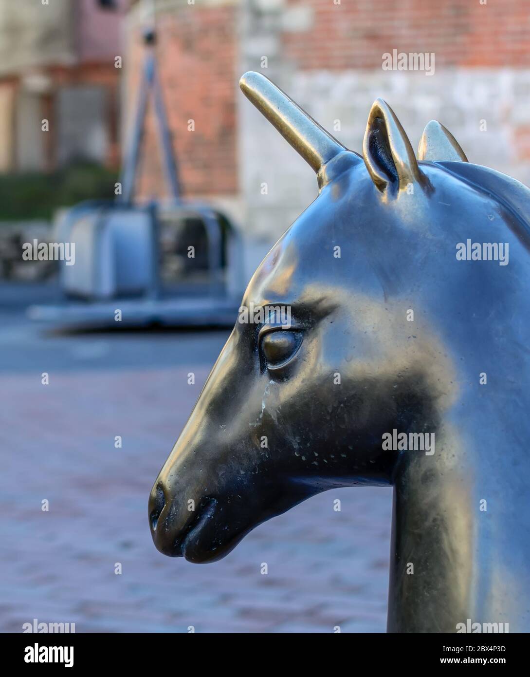 Head of bronze Unicorn sculpture Stock Photo