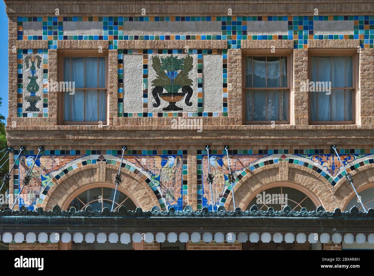 Art Deco/Spanish Colonial Revival tile work on facade of Hamilton Hotel (1923), Matamoros Street, Laredo, Texas, USA Stock Photo