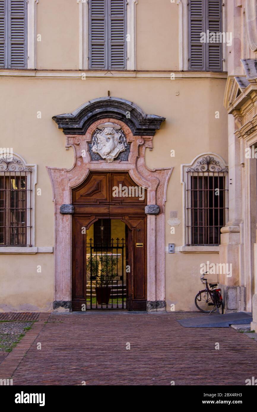 Door on the Right Side of San Giovanni Evangelista Church, Parma, Italy Stock Photo