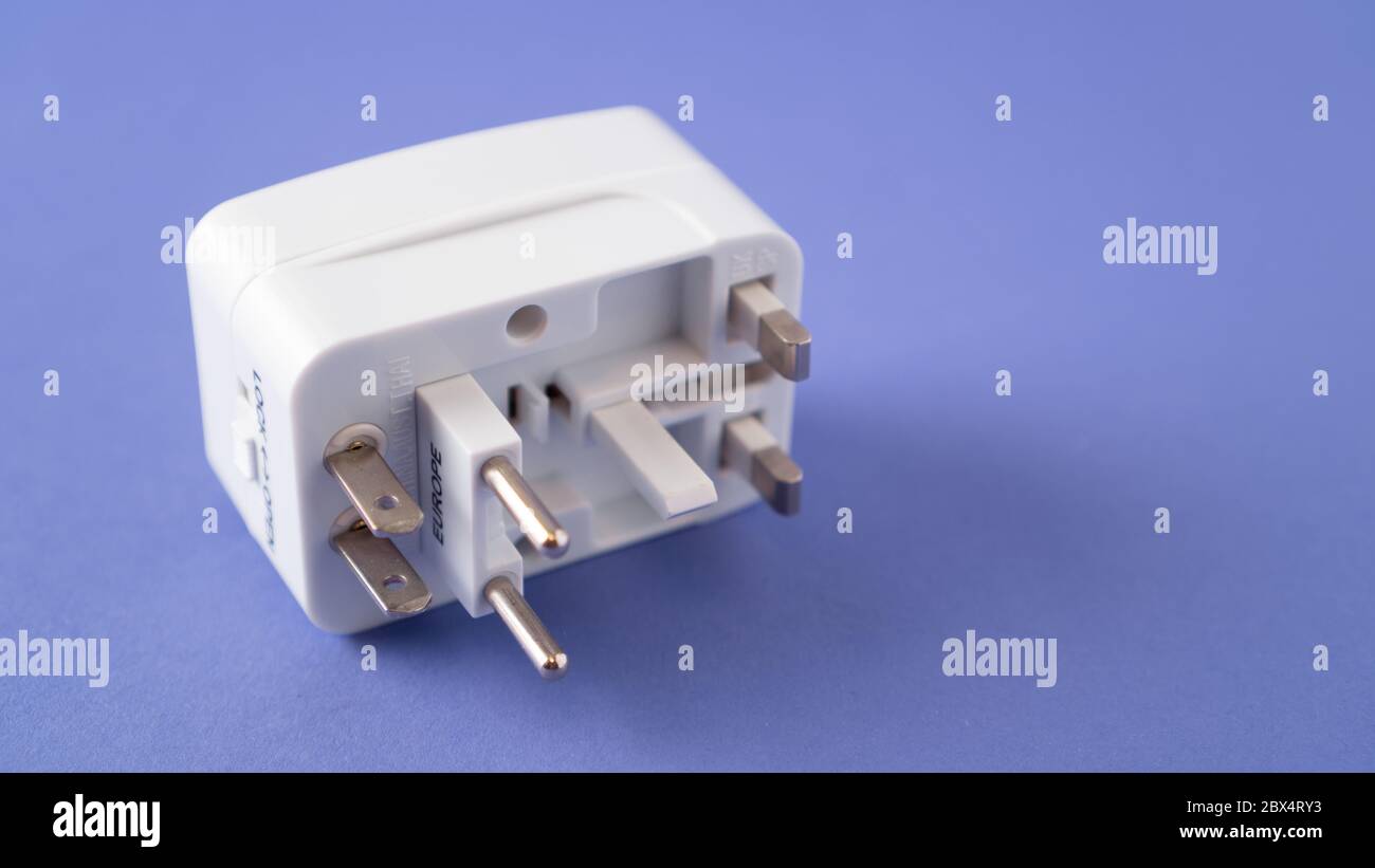 Universal international worldwide travel AC power plug adapter AU UK US EU. Universal multi socket. Double USB Port. Stock Photo