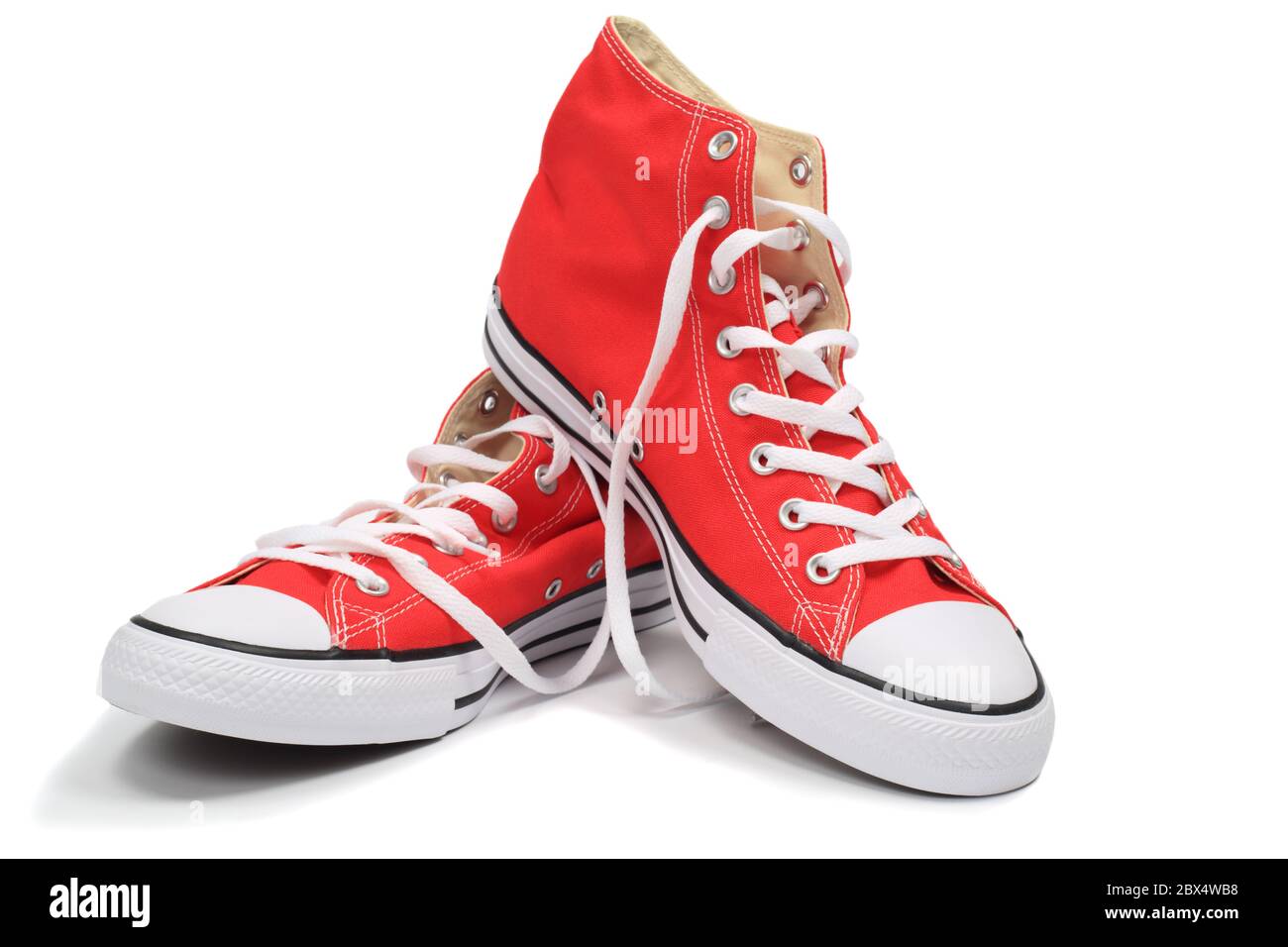 Red canvas sneakers, isolated with clipping path Stock Photo