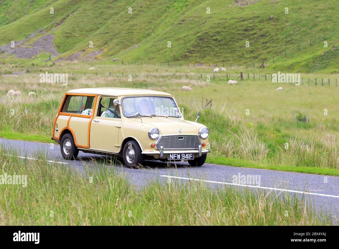 MOFFAT, SCOTLAND - JUNE 29, 2019: 1967 Austin Mini Countryman car in a classic car rally en route towards the town of Moffat, Dumfries and Galloway Stock Photo