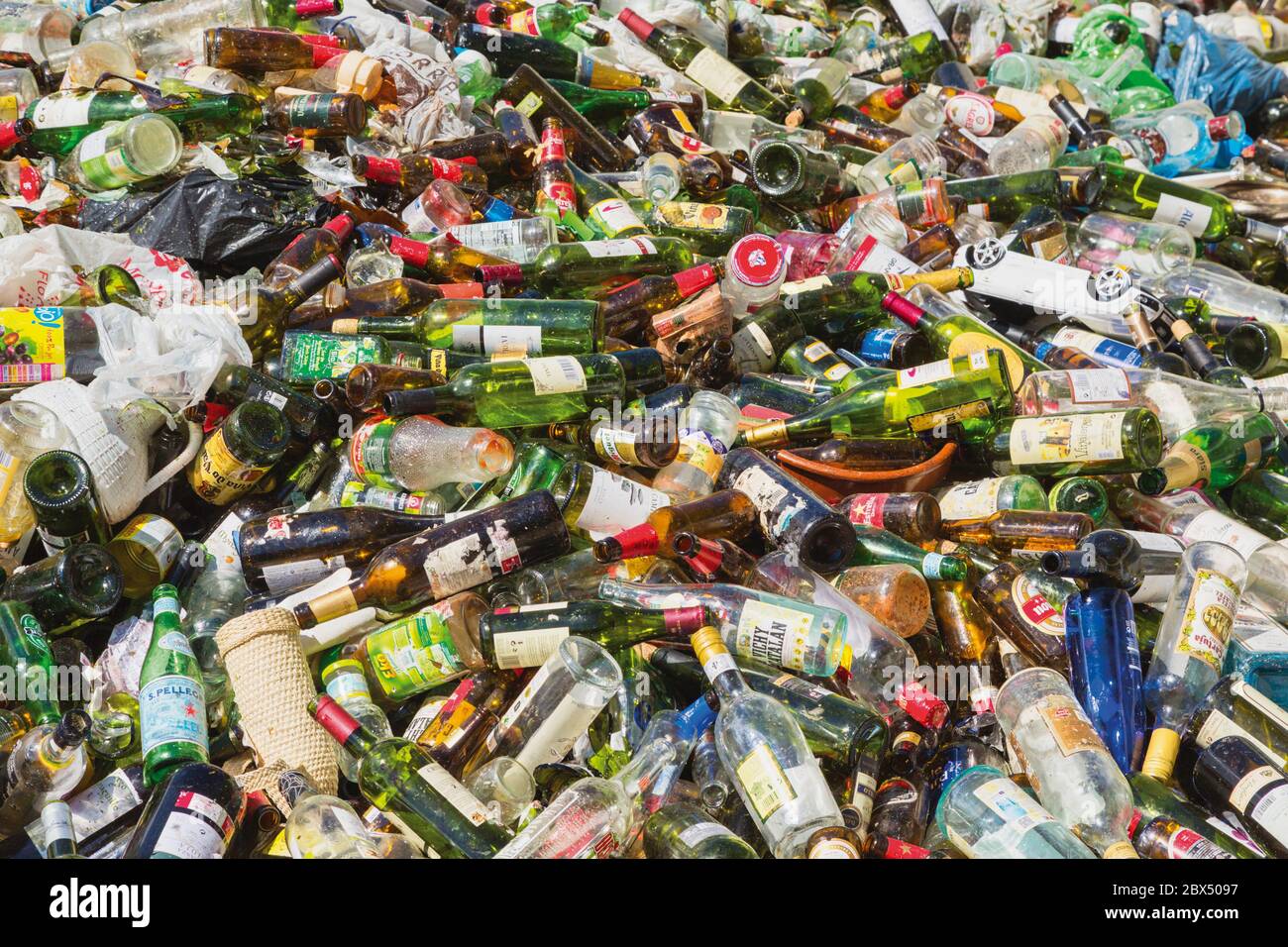 Pile of empty, used bottles ready for recycling. Stock Photo