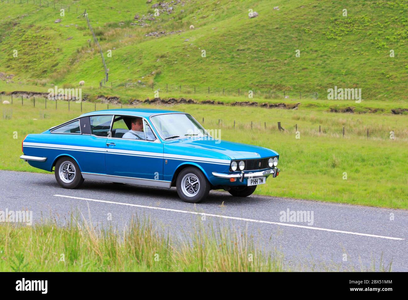MOFFAT, SCOTLAND - JUNE 29, 2019: 1973 Sunbeam Rapier H120 car in a classic car rally en route towards the town of Moffat, Dumfries and Galloway Stock Photo
